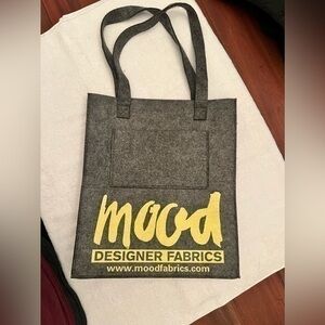 “Welcome to MOOD” Charcoal Felt Mood Bag with Yellow Logo